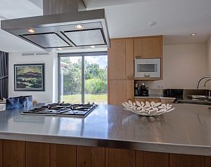 Kitchen overlooking the garden in Park Duynzoom - Villa Duynzoom, vacation home Texel.