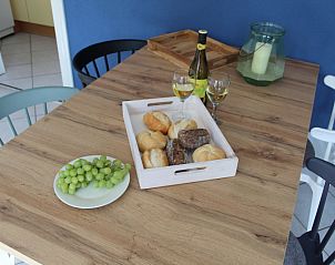 Breakfast table at Riddertje, vacation home in De Koog, Texel. Enjoy a delicious breakfast on the Wadden Island.
