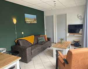 Cozy sitting area in Riddertje, vacation home in De Koog, Texel. Perfect for relaxing after a day on the island.