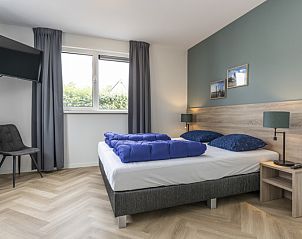 Bedroom in Villa 39, De Koog, Texel. Comfortable vacation home for a relaxing stay on the Wadden Islands.