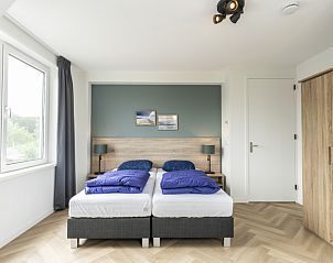 Second bedroom in Villa 39, De Koog, Texel. Cozy vacation home with comfortable beds on the Wadden Islands.