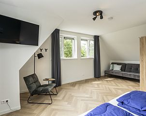Bright attic room in Villa 39, De Koog, Texel. Spacious vacation home with extra sleeping accommodation on the Wadden Islands.