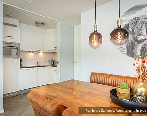 Stylish kitchen in Type 1 vacation home, De Koog, Texel with dining area and atmospheric lighting.