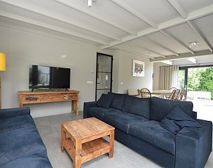 Wohnzimmer mit Fernseher in Ruijslaan 73, De Koog, Texel, ideal zum Entspannen.