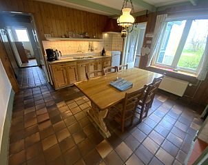 Cozy kitchen with window in Voorhuis vacation home De Koog Texel.
