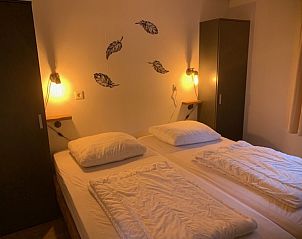 Cozy bedroom with double bed Chalet Bregkoog 203 in De Koog, Texel.