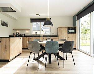 Stylish dining area and kitchen in Villa 37, De Koog, Texel. Ideal vacation home on the Wadden Islands.