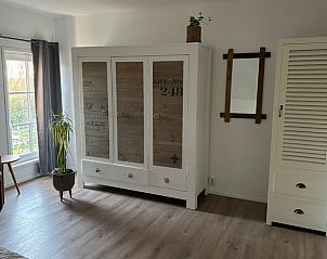 Spacious bedroom with comfortable beds in Cottage in De Koog, Texel, perfect for a good night's sleep.