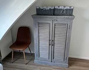 Cozy bedroom with two single beds and skylight in Cottage in De Koog, Texel.