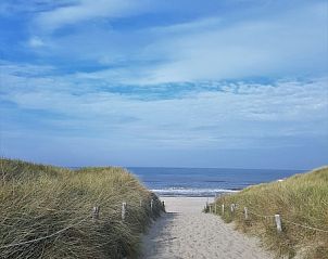 Beautiful beach path near vacation home De Anemoon in De Koog, Texel, overlooking the sea.