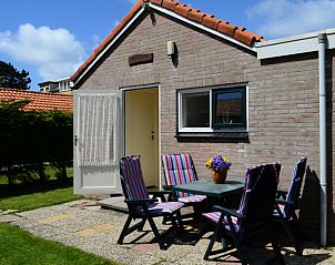 Gemtliche Terrasse im Ferienhaus Brink 20 in De Koog Texel, ideal fr Mahlzeiten im Freien auf den Watteninseln.