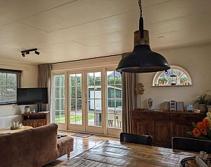 Bright living space in D' Duinster vacation home, De Koog, Texel overlooking garden on the Wadden Islands.