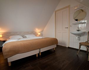 Comfortable bedroom in D' Duinster vacation home, De Koog, Texel with double bed on the Wadden Islands.