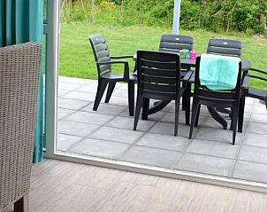 Terrace with garden furniture at Kustpark houses in De Koog, Texel, ideal for outdoor relaxation on the Wadden Islands.