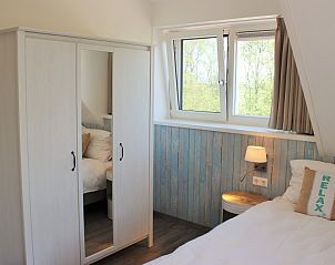 Gemtliches Schlafzimmer mit Aussicht in 6-8 Pers. Wellness Landhuis, De Koog, Texel.