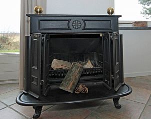 Sfeervolle houtkachel in Waddenstaete 5 pers. vakantiehuis, De Koog, Texel, voor gezellige avonden