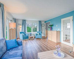 Spacious living room in Holiday home Honeysuckle 55 on Texel, perfect for relaxation.