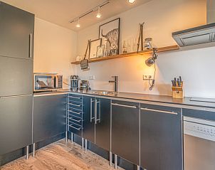 Vollstndig ausgestattete Kche im Appartement Zee van Tijd, De Koog, Texel. Kochen Sie bequem whrend Ihres Aufenthalts auf den Watteninseln.