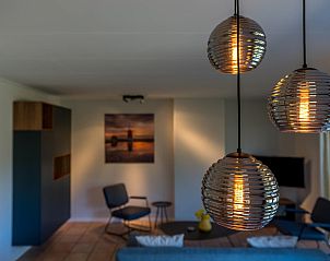 Atmospheric lamps in Zilte Bries vacation home, De Koog, Texel, create warm ambiance.