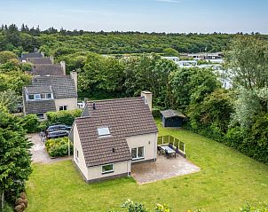 Aerial view of Holiday home Honeysuckle 45 in De Koog, Texel, surrounded by greenery and tranquility.