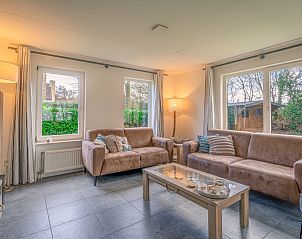 Cozy living room in Holiday Home Honeysuckle 45, De Koog, Texel, with comfortable sofas.
