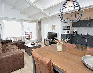 Spacious kitchen and dining area in Motel Texel - Apartment 314/1S, De Koog, with modern amenities.