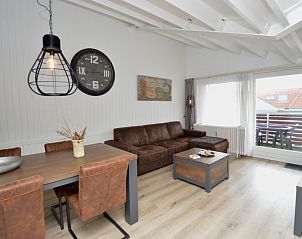 Bright interior of Motel Texel - Apartment 314/1S in De Koog, Texel, overlooking the balcony.
