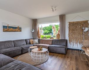 Comfortable sitting area in Cottage in De Koog, Texel, with garden view, Wadden Islands.