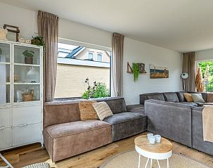 Cozy sitting area in Cottage in De Koog, Texel, overlooking garden, Wadden Islands.