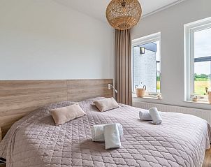 Bedroom with garden view in Cottage in De Koog, Texel, Wadden Islands.