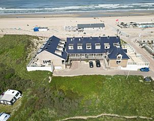 Aerial photo of Resort De Buteriggel Apartment 1, located on the beach in De Koog, Texel, Wadden Islands.