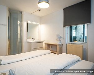 Comfortable bedroom in Type 3A vacation home, De Koog, Texel with double bed and modern furnishings.