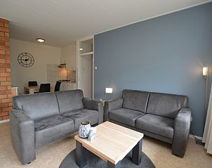 Cozy sitting area in Apartment Kerckeland 122, De Koog, Texel with stylish furniture.