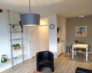 Stylish dining area in 't Kerckeland - Apartment Kerckeland 82, De Koog, Texel, perfect for a relaxing meal on the Wadden Islands.