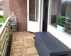 Spacious terrace at 't Kerckeland - Apartment Kerckeland 82, De Koog, Texel, ideal for relaxing and enjoying the fresh air.