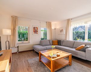 Cozy living room of Holiday home Kamperfoelie 61, De Koog, Texel with comfortable seating area.
