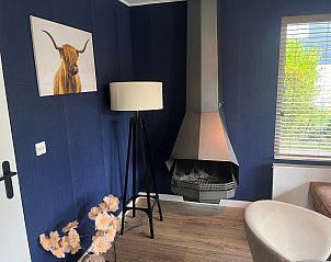 Stylish fireplace in De Duinven vacation home De Koog Texel