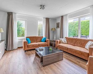 Comfortable seating area in Holiday home Honeysuckle 49, De Koog, Texel, with modern furniture.