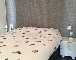 Comfortable bedroom in Chalet Bregkoog 224, De Koog, Texel, with stylish interior.