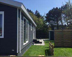 Sunny terrace at Chalet Bregkoog 224, De Koog, Texel, perfect for outdoor relaxation.