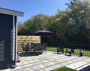 Spacious terrace with seating at Chalet Bregkoog 224, De Koog, Texel.