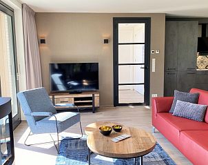 Cozy sitting area with television in 6 Pers.Landhuis de Luxe Eldorado Texel, De Koog.