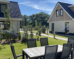Outdoor seating at 6 Pers.Landhuis de Luxe Eldorado Texel, vacation home in De Koog.