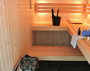 Private sauna in 6 Pers.Landhuis de Luxe Eldorado Texel, De Koog, for ultimate relaxation.
