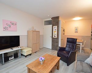 Modern dining and sitting area in Apartment Kerckeland 70, vacation accommodation in De Koog, Texel.