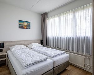 Comfortable bedroom in Two persons apartment large - first floor, De Koog, Texel with two single beds.