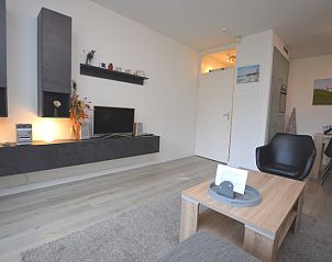 Modern entertainment corner in Apartment Kerckeland 106, De Koog, Texel with flat-screen TV.