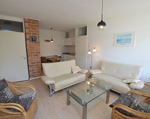 Cozy sitting area in Apartment Kerckeland 80 in De Koog on Texel, Wadden Islands, with comfortable sofas.