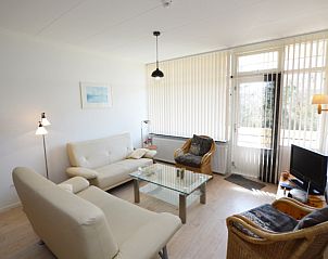 Stylish interior of Apartment Kerckeland 80, De Koog, Texel, with modern interior and views of nature.