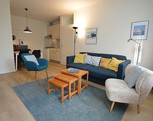 Cozy living room in Apartment Kerckeland 126, De Koog, Texel, with comfortable seating area and modern furnishings.